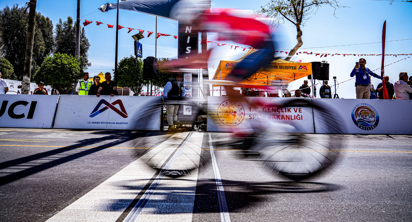 Cyclist crossing the finish line at a road race